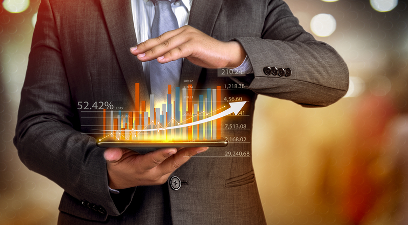 Stock trader with graphs of data